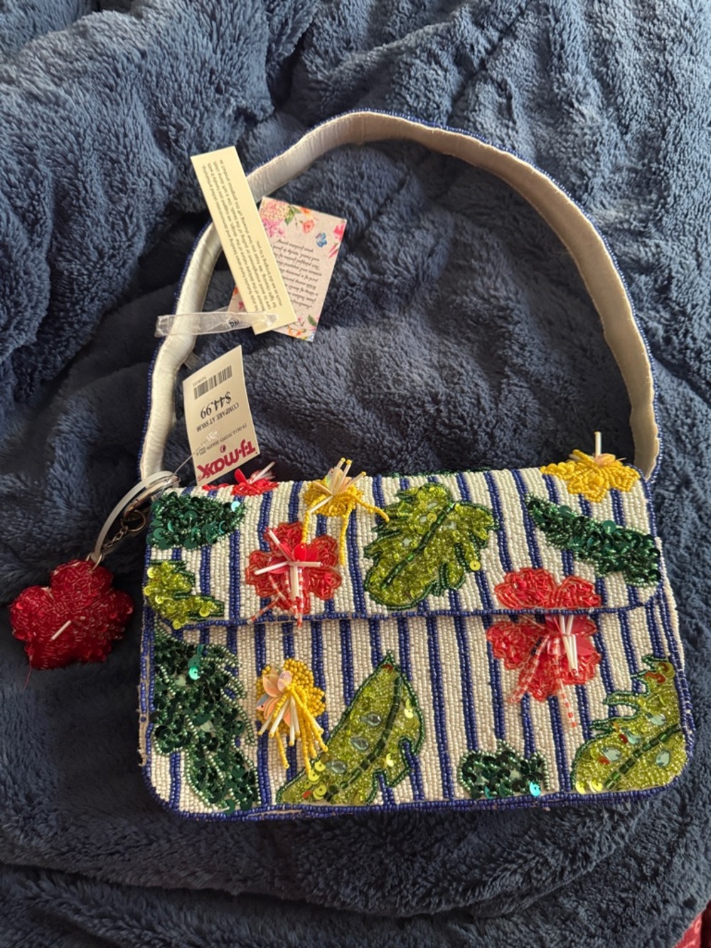 Beaded bag with charm